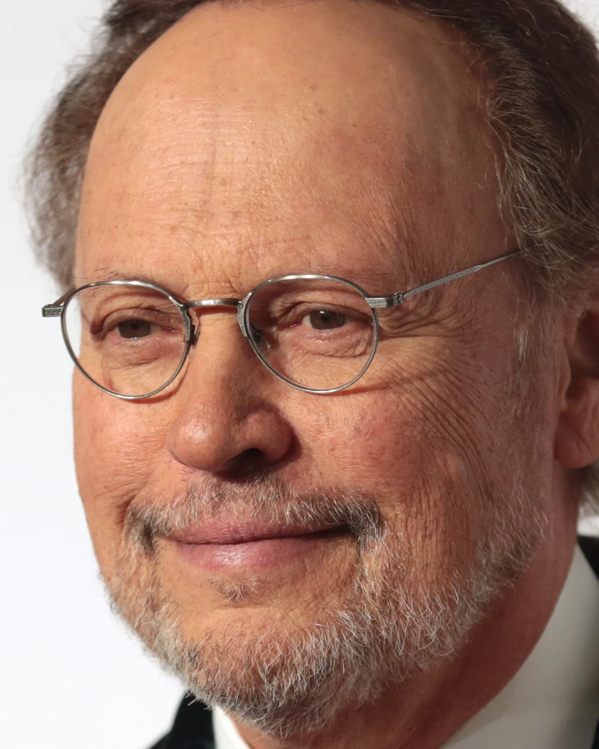 Billy Crystal Biography: Comedian, actor, and nine-time Oscars host